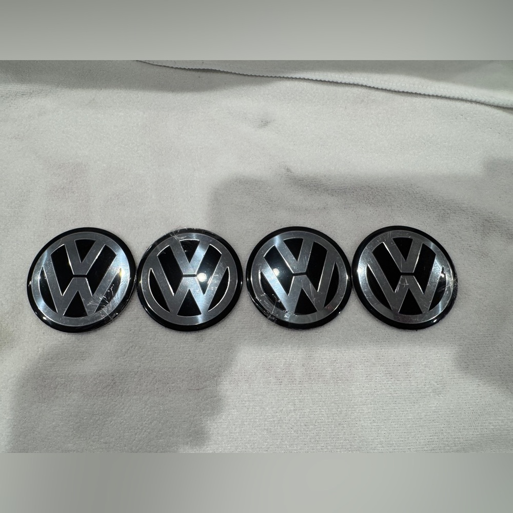 Four VW Volkswagen center cap emblems 60mm in diameter